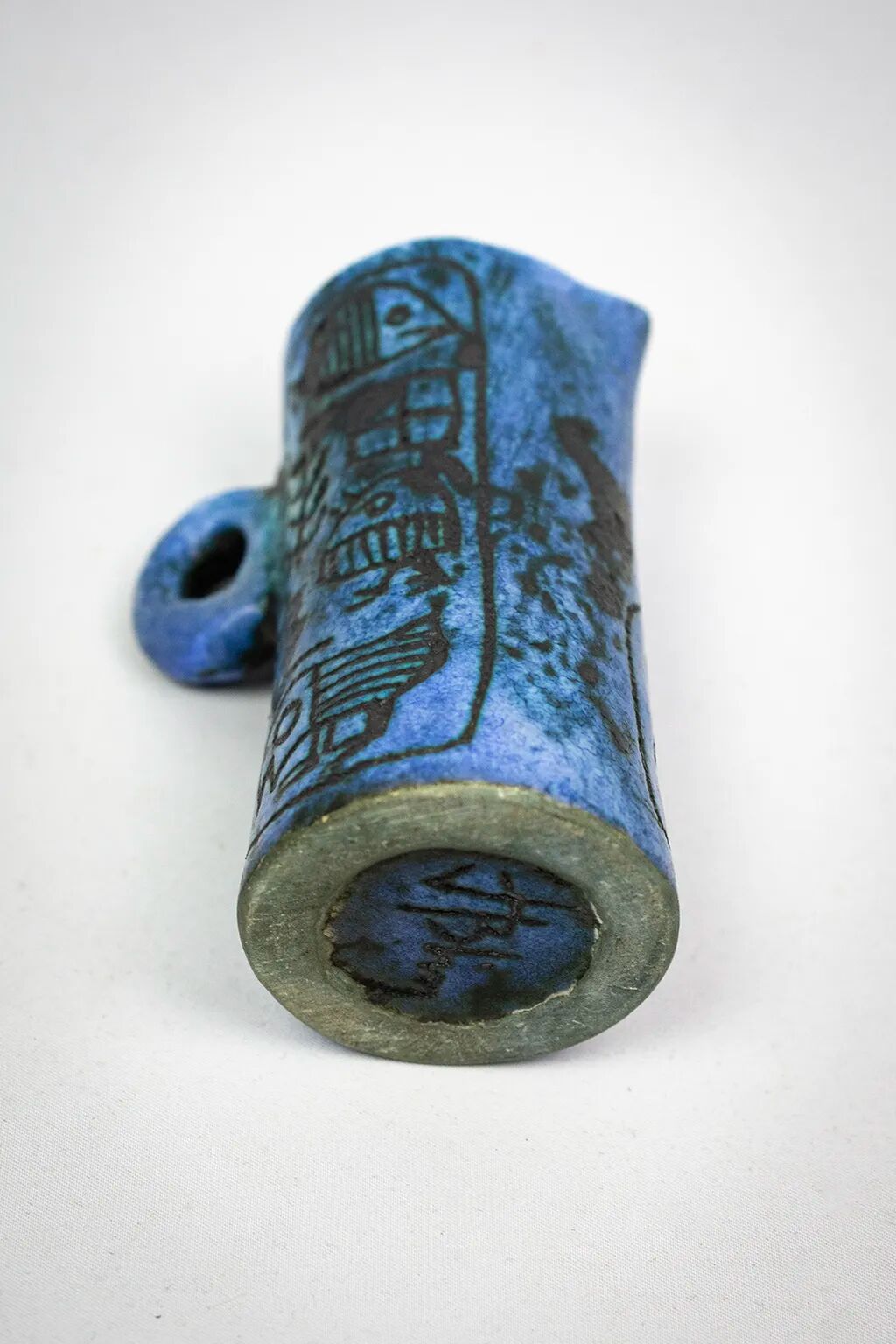 Small jug by Jacques Blin in blue ceramic with engraved animal decoration.