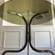 Table ronde en verre fumé et chrome