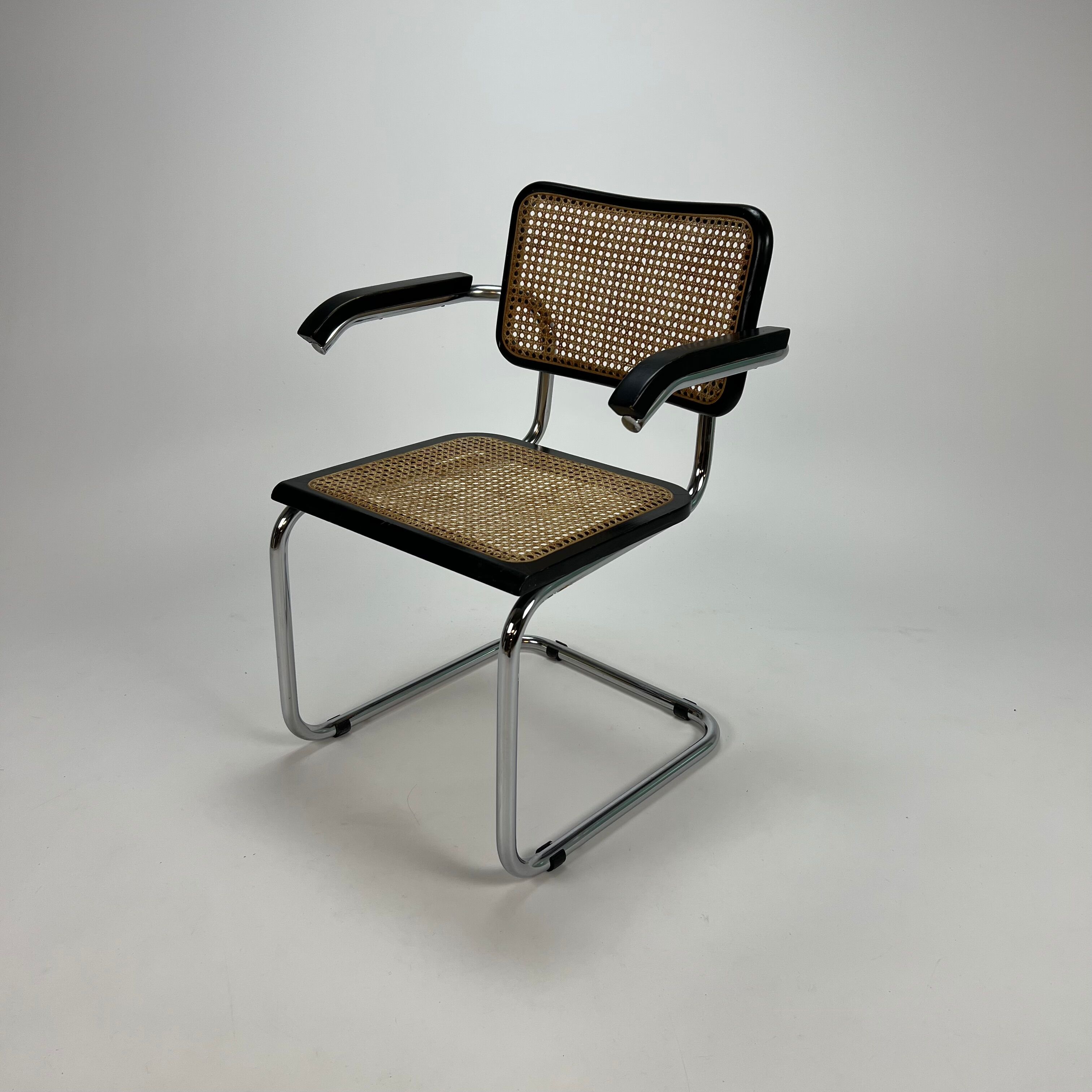 Tubular frame and cane cantilever arm chairs by Marcel Breuer, italy, 1970s