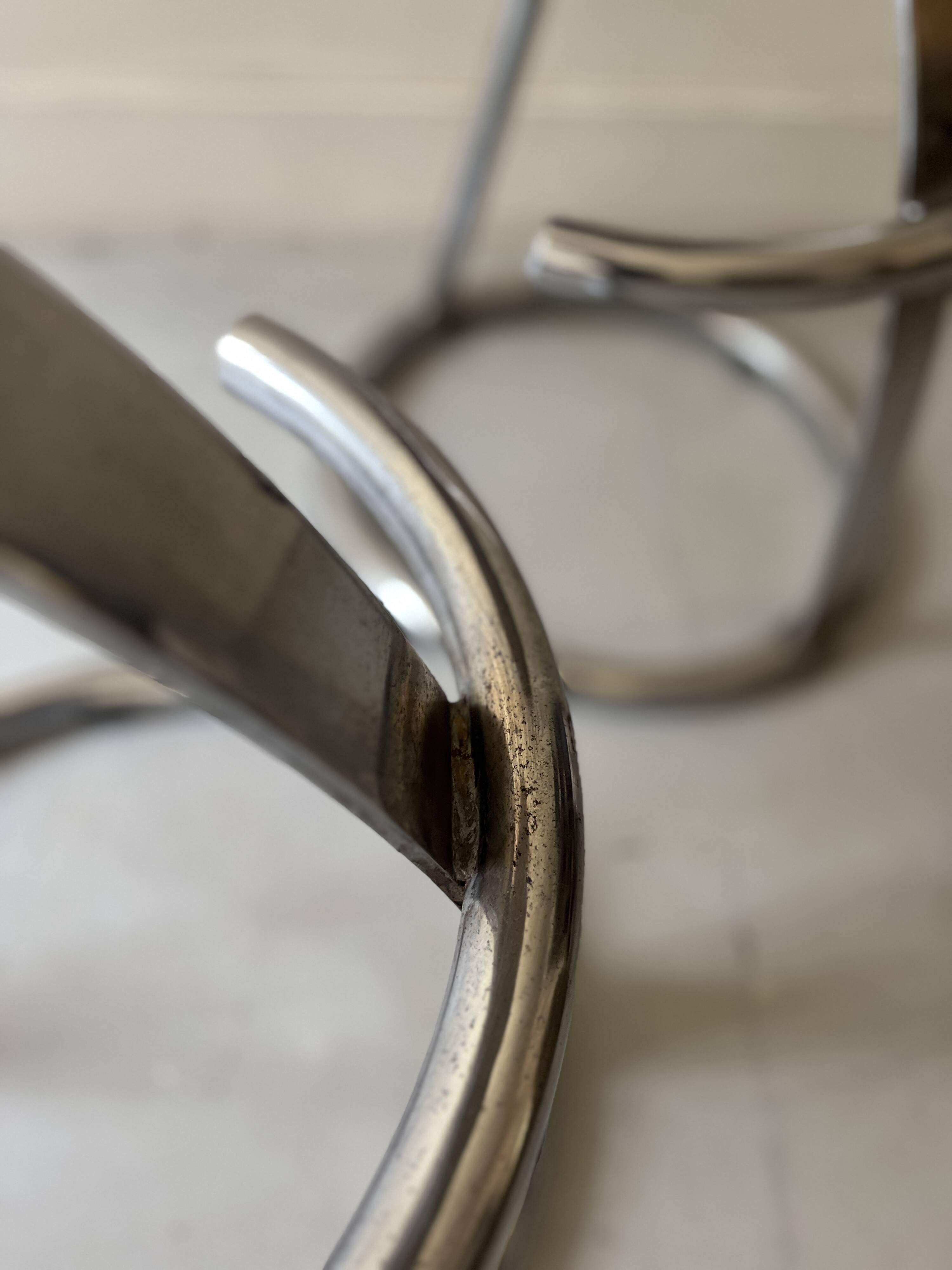 Bar stools in tubular chrome and tan leather, 1970s