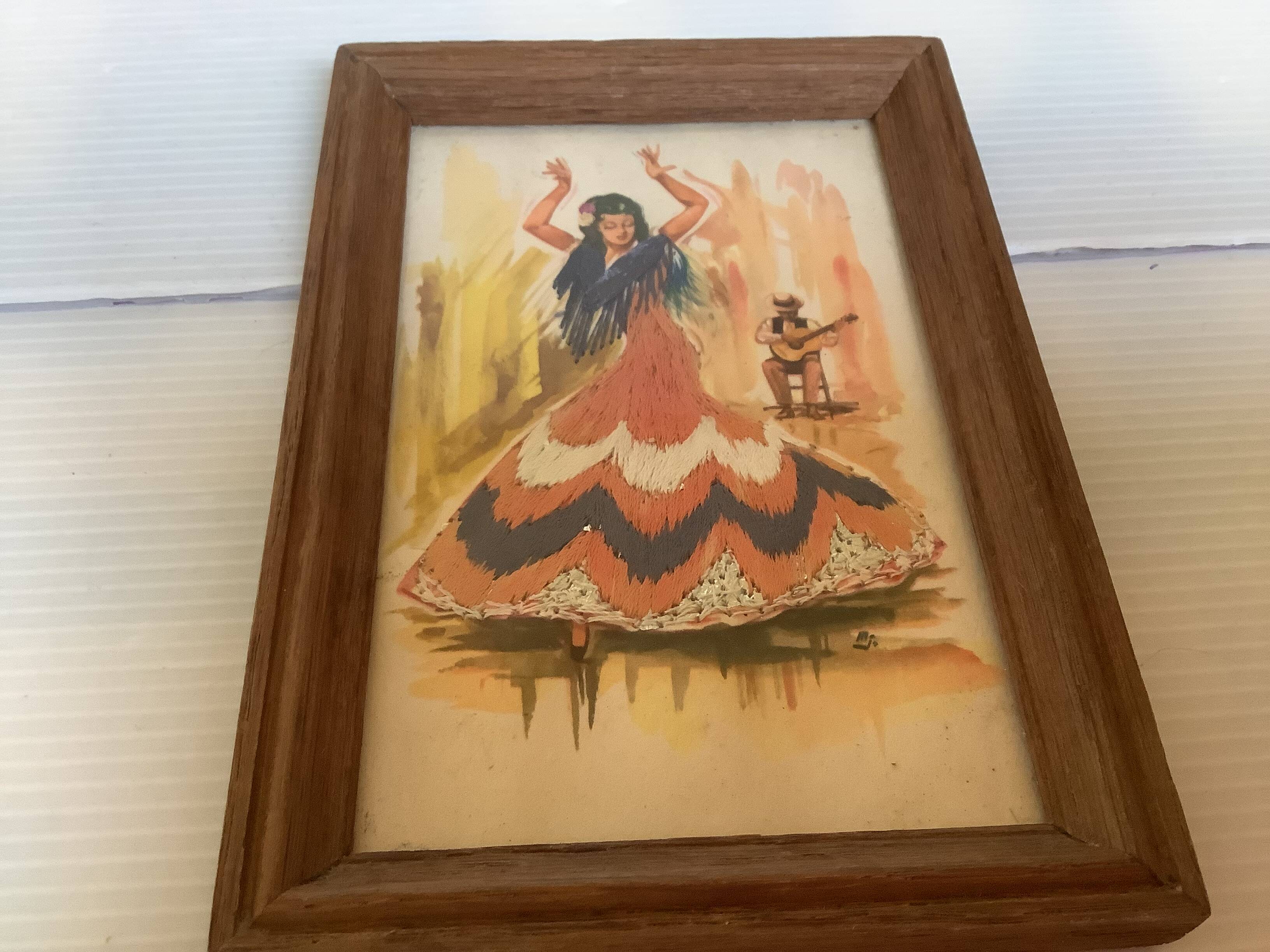 Pair of small frames with Spanish illustrations