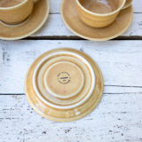 6 coffee cups and 6 sandstone saucers
