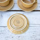 6 coffee cups and 6 sandstone saucers