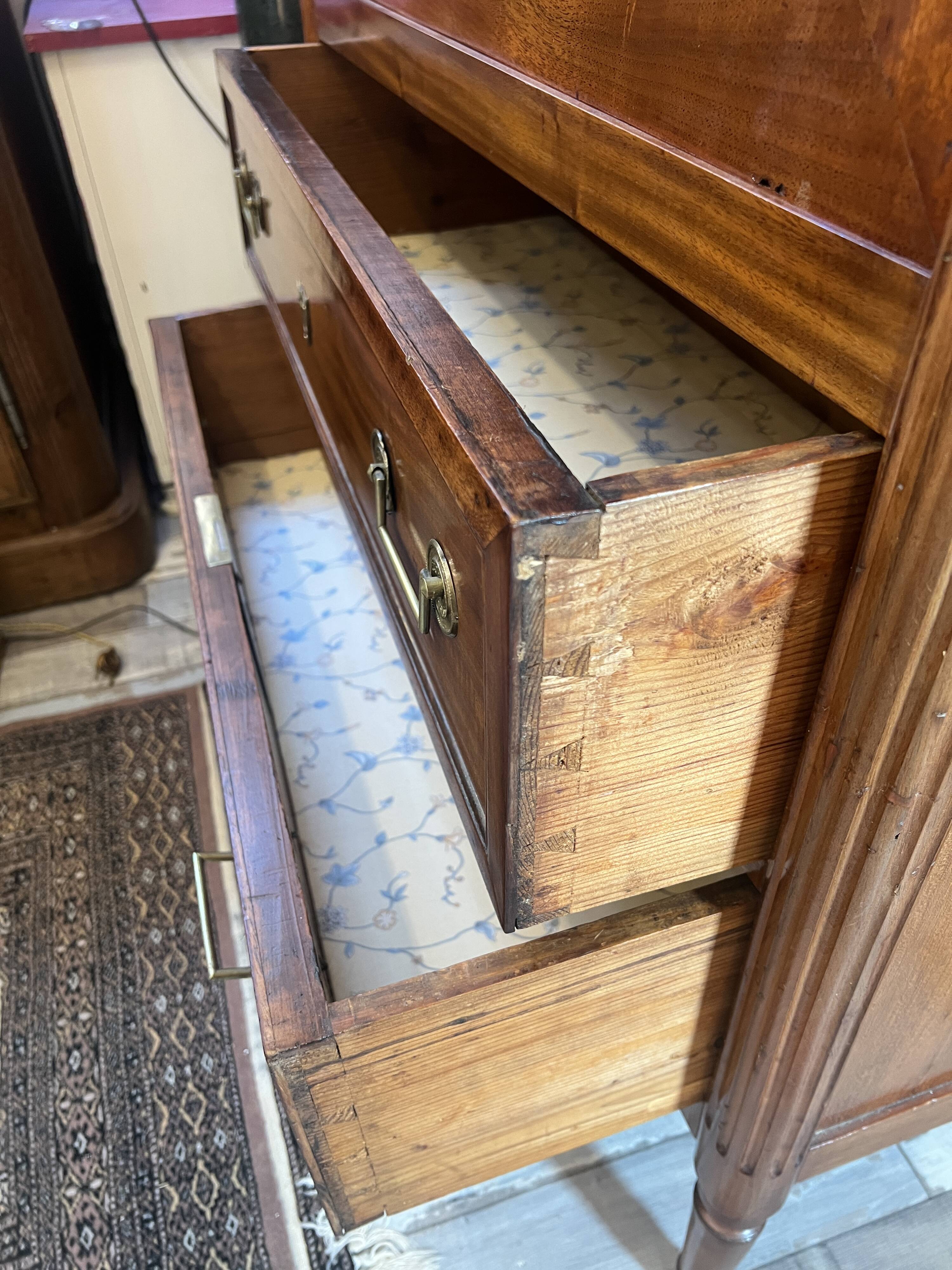 Louis XVI period mahogany secretary, white marble top, clover lock