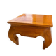 Small solid teak coffee table in opium style.