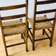 Paire de chaises rustiques en bois et assises paillées