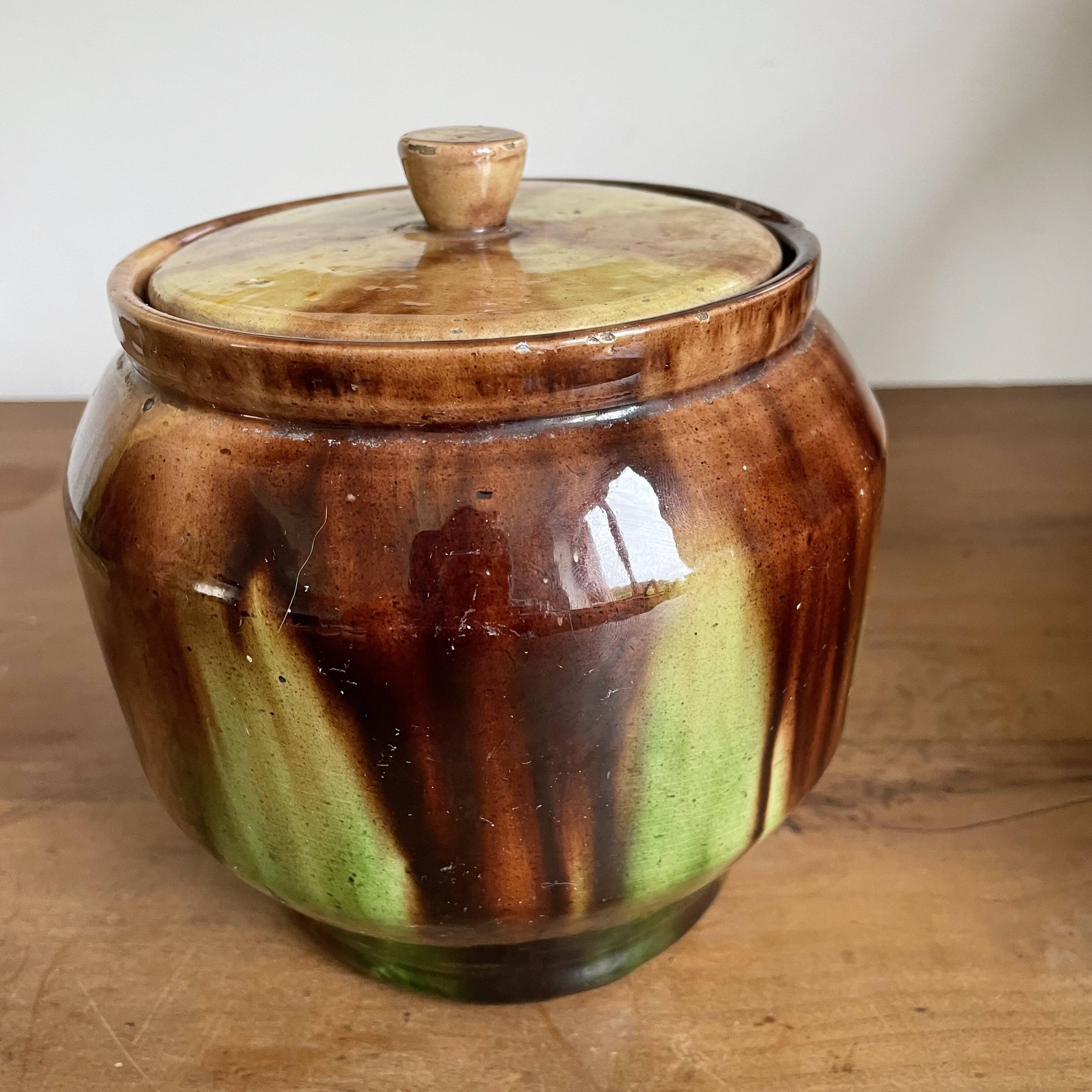 Glazed terracotta covered pot