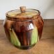 Glazed terracotta covered pot