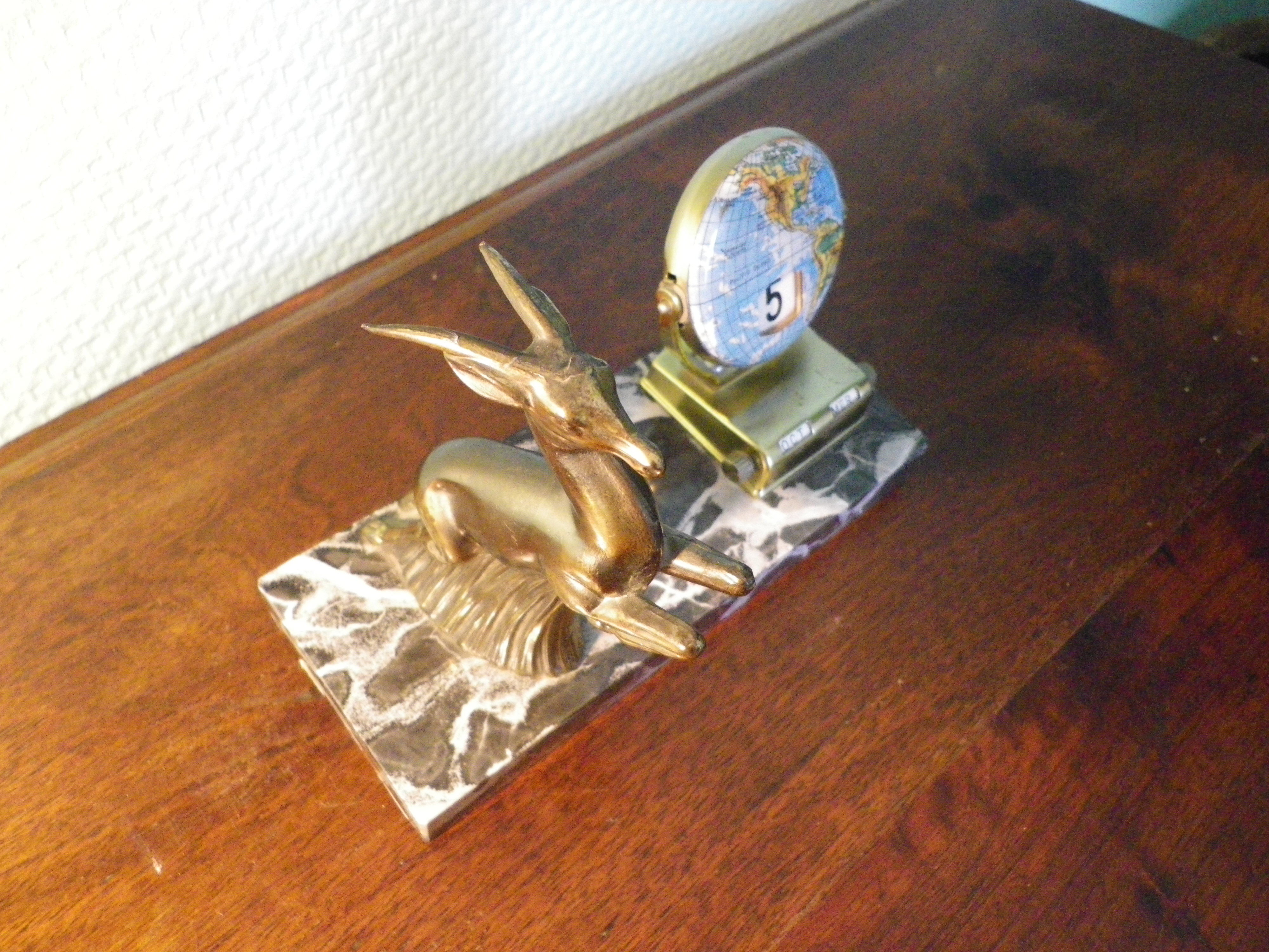 Perpetual calendar on marble base with marble patinated regulated decoration, 60s
