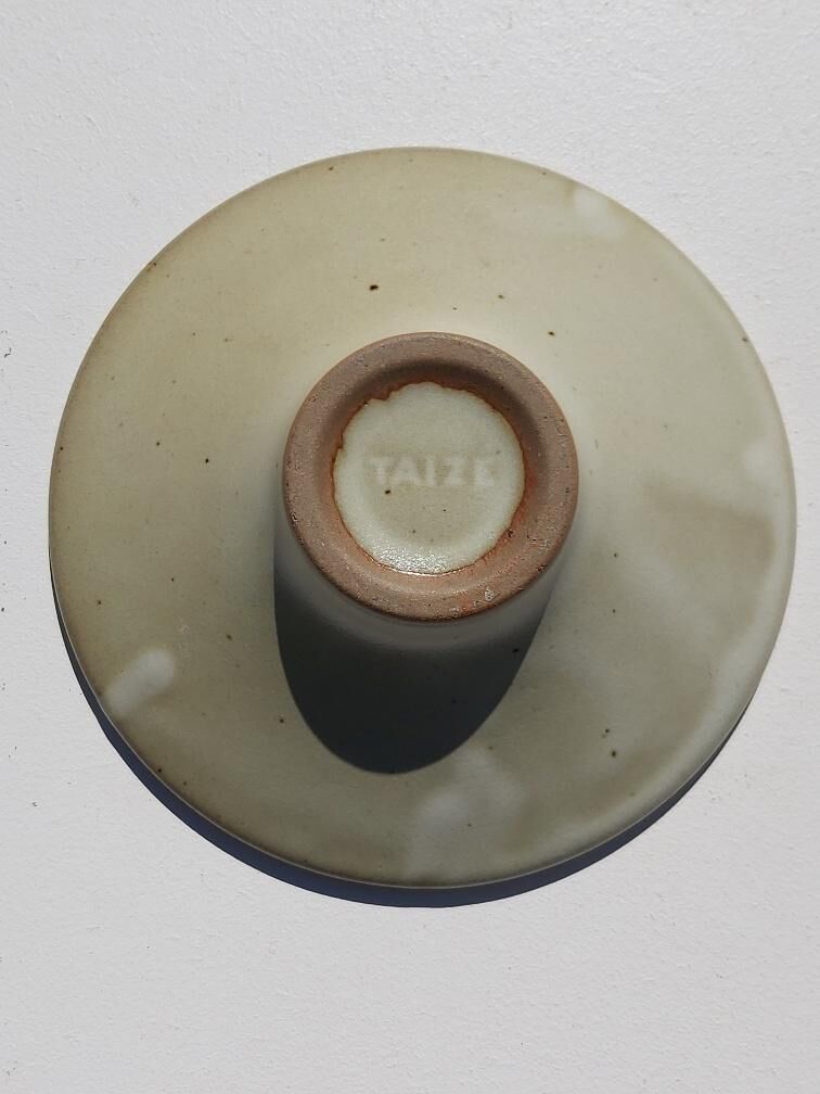 Taizé flower picket cut in sandstone