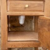 Small antique washbasin in wood and red marble.