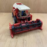 Red combine harvester