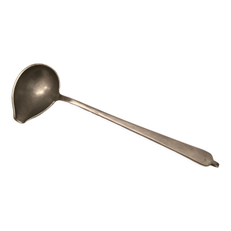 Old large sauce spoon with spout
