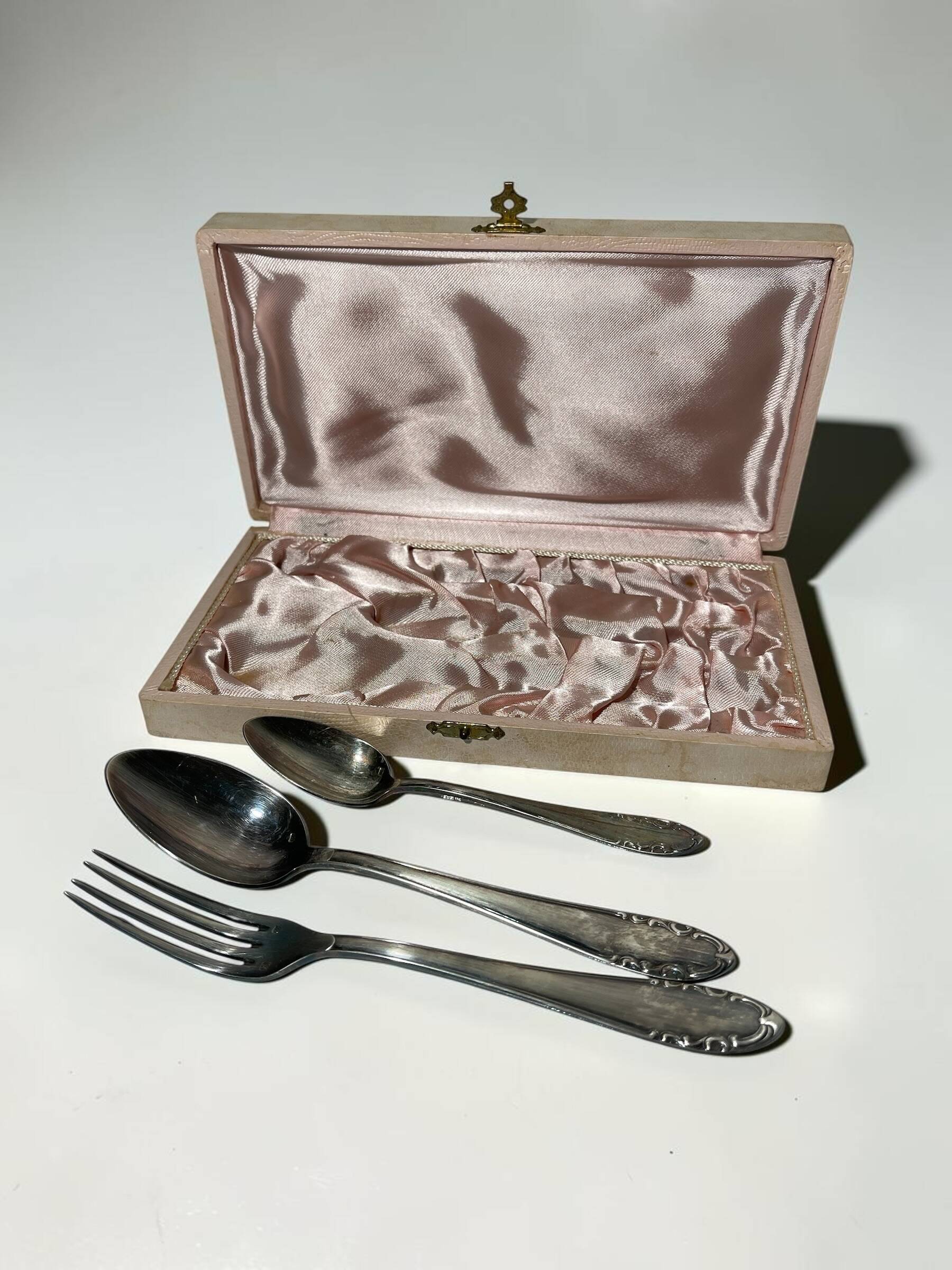 Set of antique silver-plated cutlery for children.