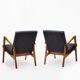 A pair of 300-138 armchairs from the 60s