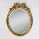 Large Antique Oval Gilt Mirror in Wood and Plaster, Belgium, 1900s