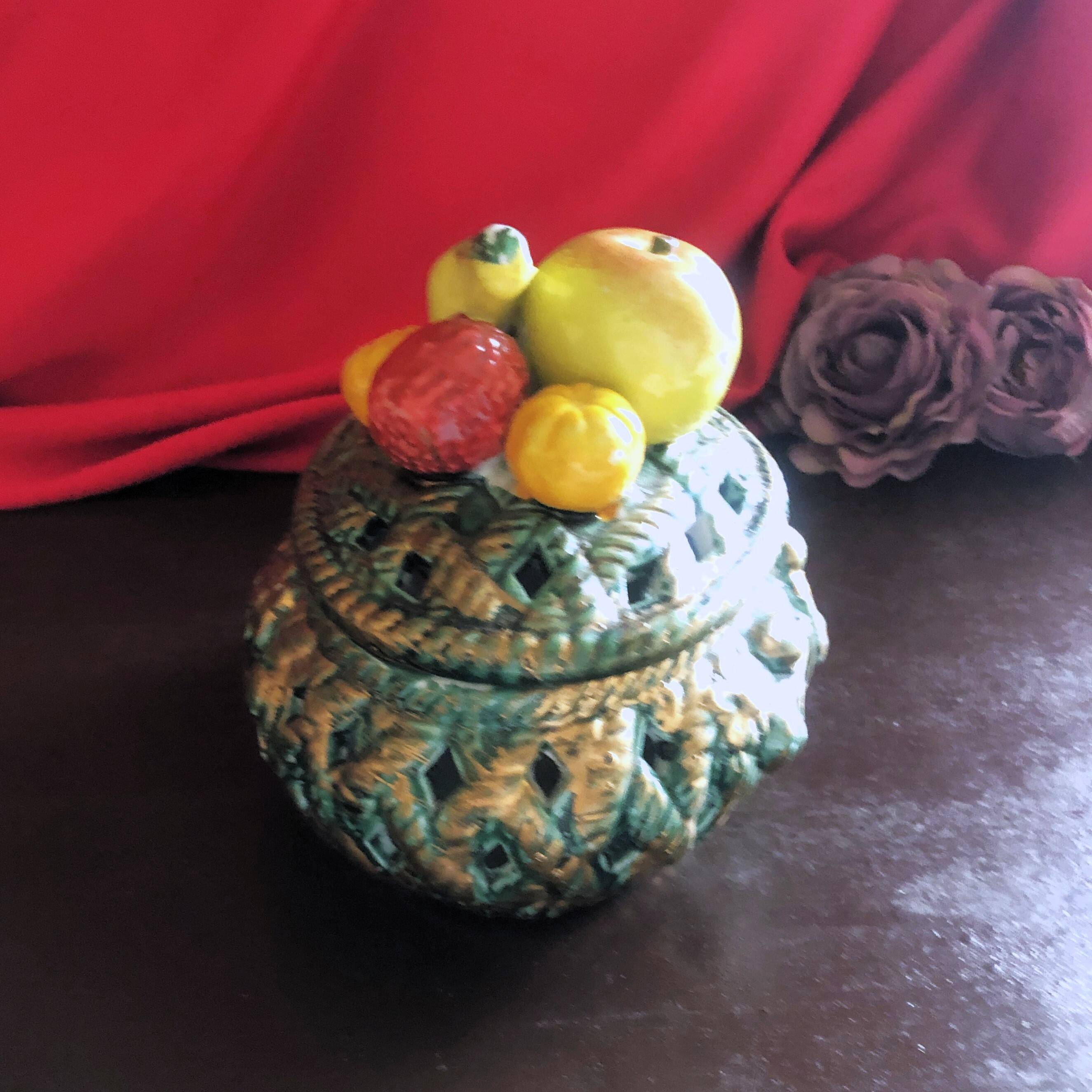 Openwork earthenware candy box with fruit slip