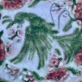 Edouard cazaux cup, firebird decoration on a background of floral seeds,