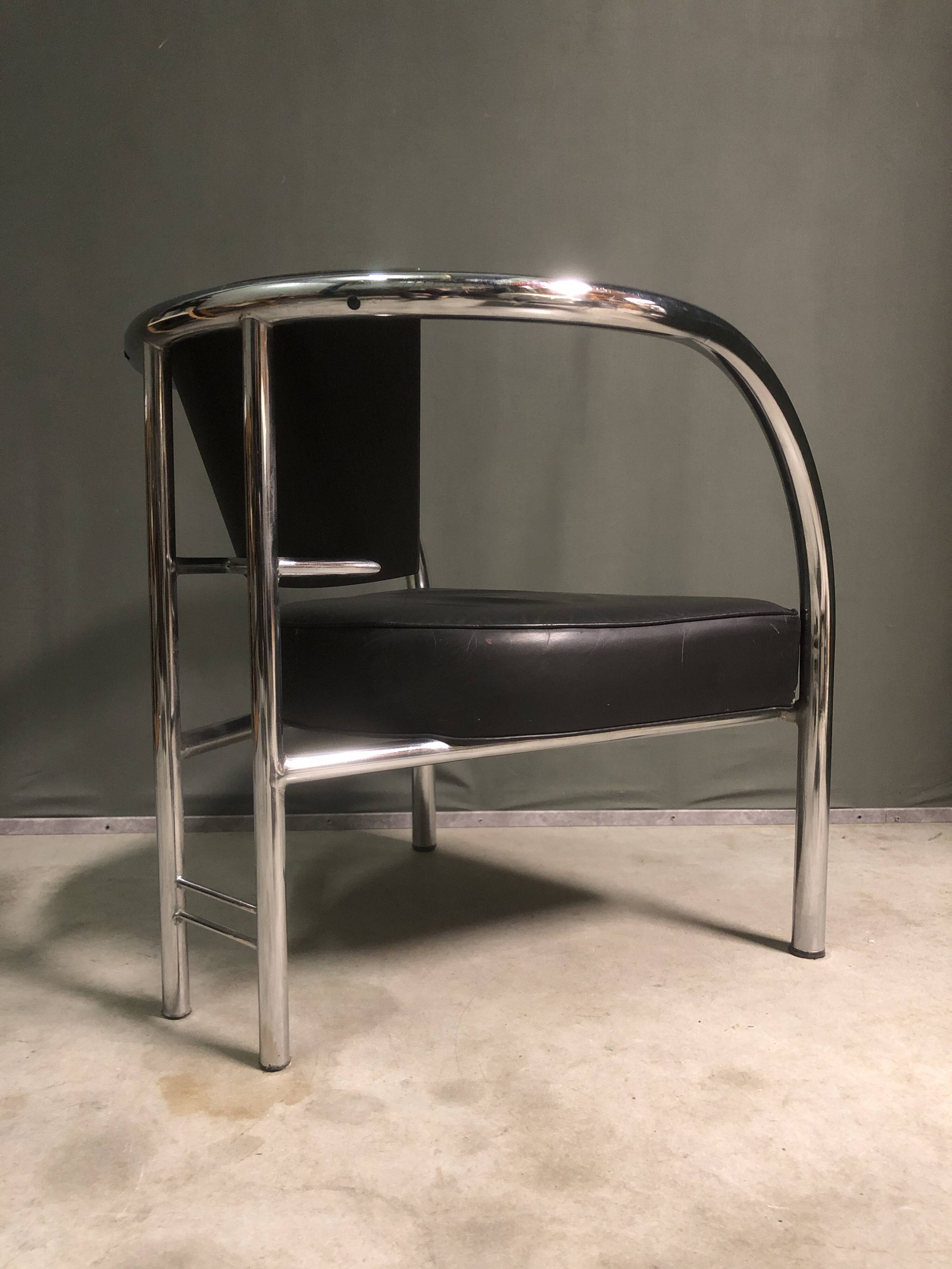 A pair of petite low armchairs by ronald cecil sportes for lumen center, 1987