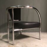A pair of petite low armchairs by ronald cecil sportes for lumen center, 1987