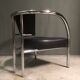 A pair of petite low armchairs by ronald cecil sportes for lumen center, 1987