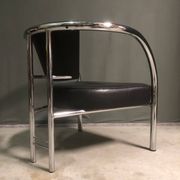 A pair of petite low armchairs by ronald cecil sportes for lumen center, 1987