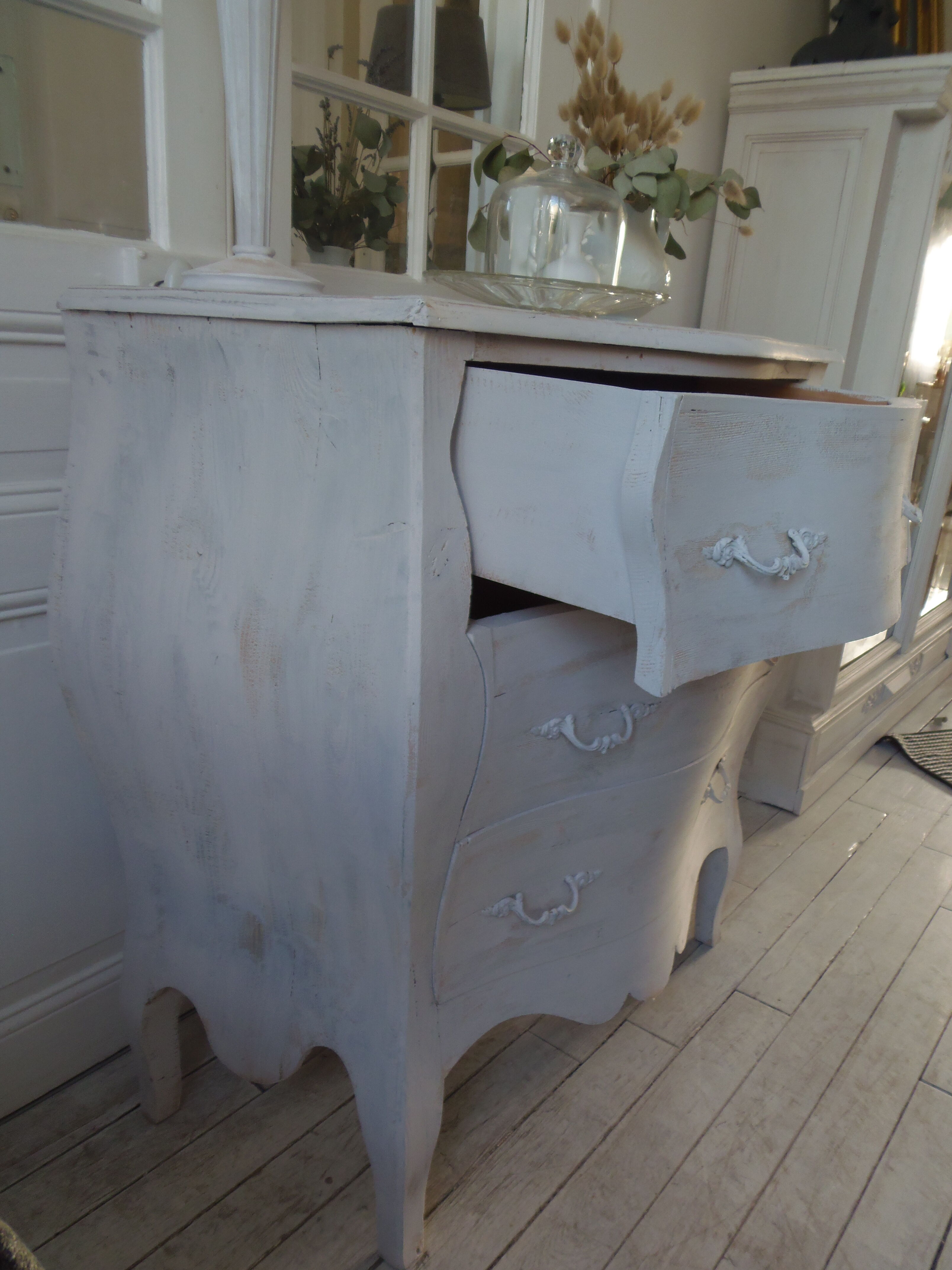 Curved patinated chest of drawers pearl grey waxed finish