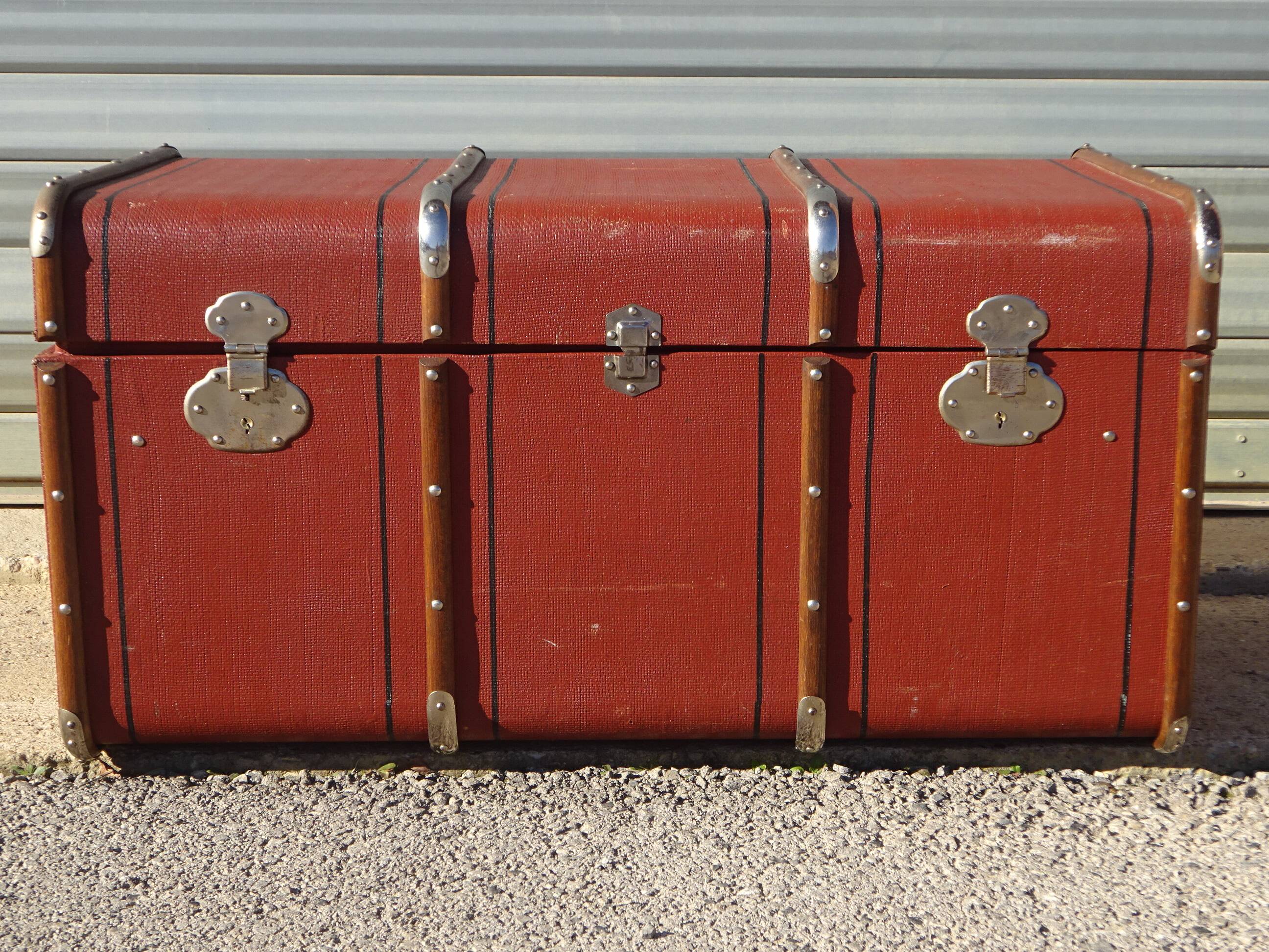 Old curved travel trunk
