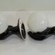 Pair of vintage 1970s wall sconces – Black hands holding an opaque globe