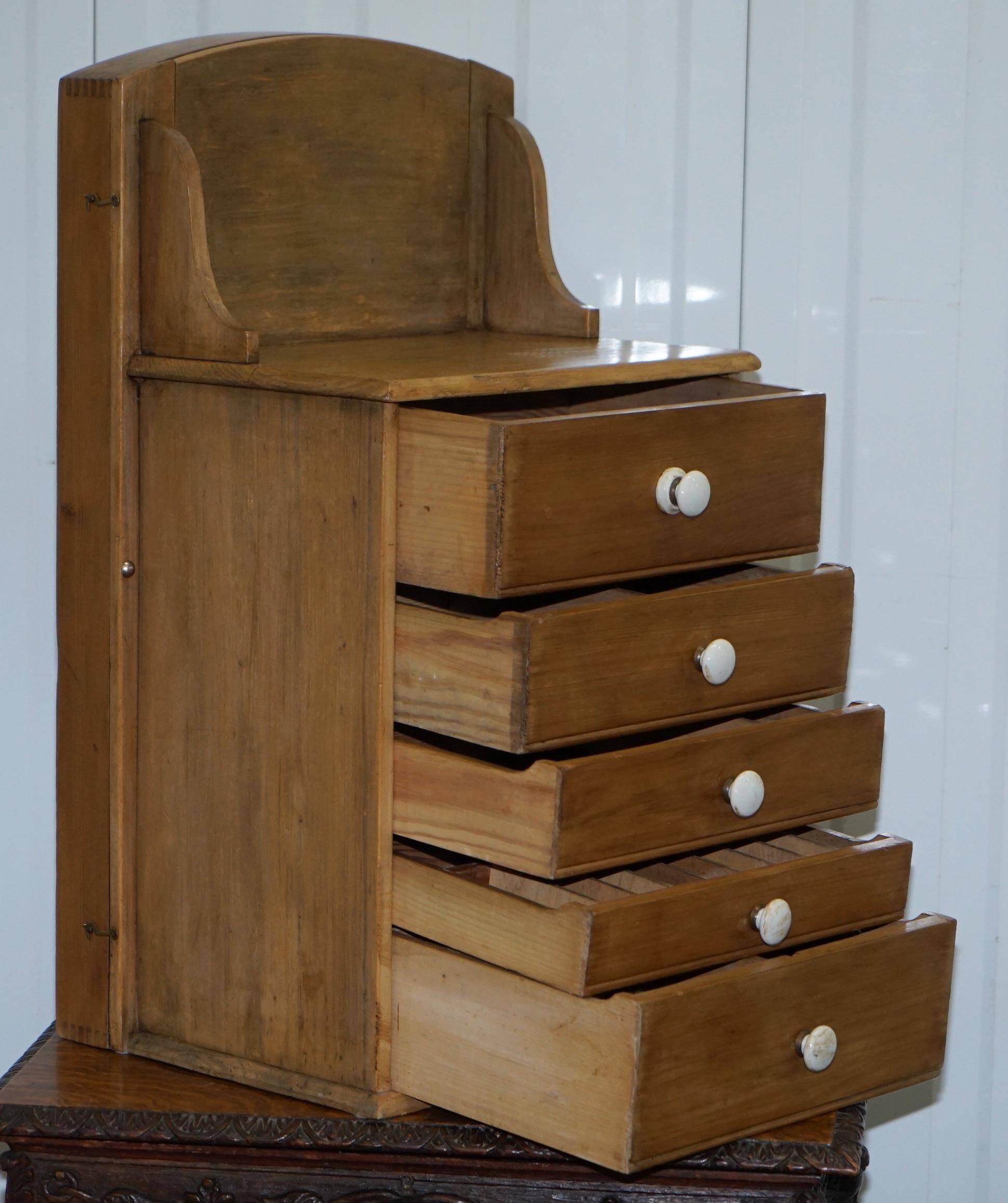 Rare Rawl display furniture from the 1950s with drawers and a showcase.