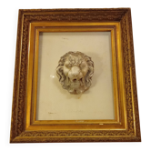 Antique large gilded frame with lion head ornament on plexiglass
