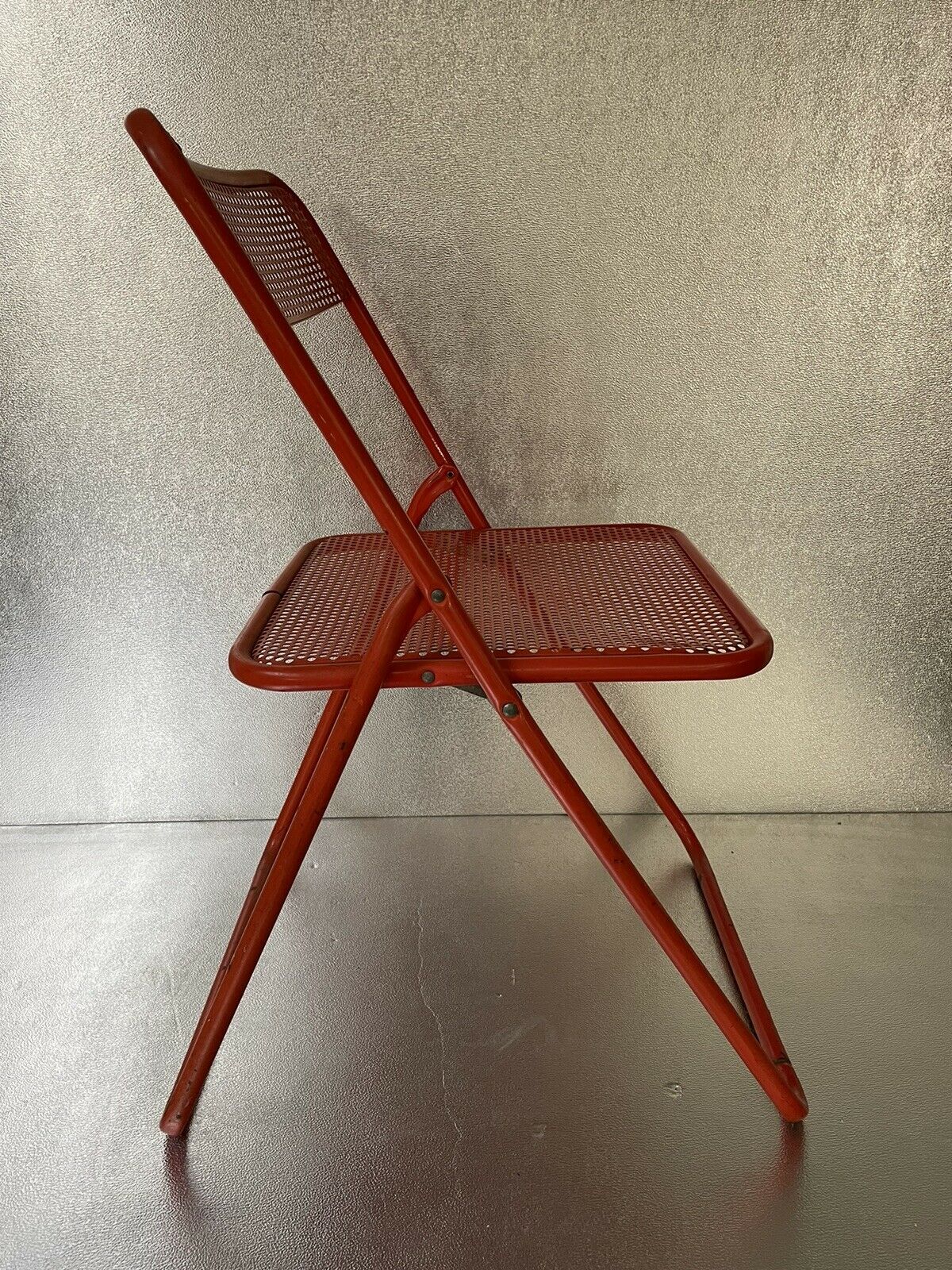 Old folding chair metal perforated red 60s, 70s, vintage