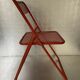 Old folding chair metal perforated red 60s, 70s, vintage