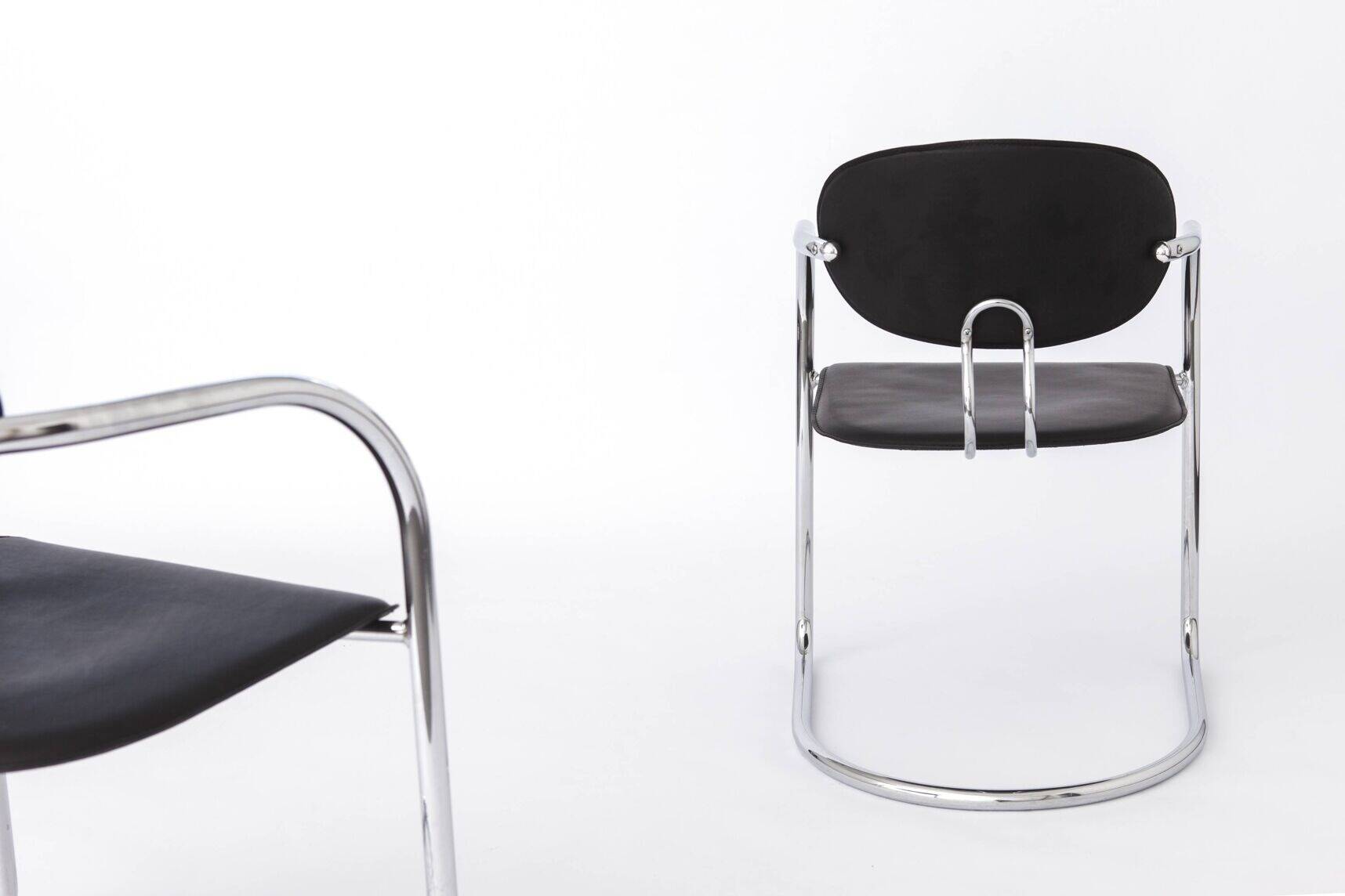 Effezeta chair, tubular chrome structure and black faux leather, made in Italy.