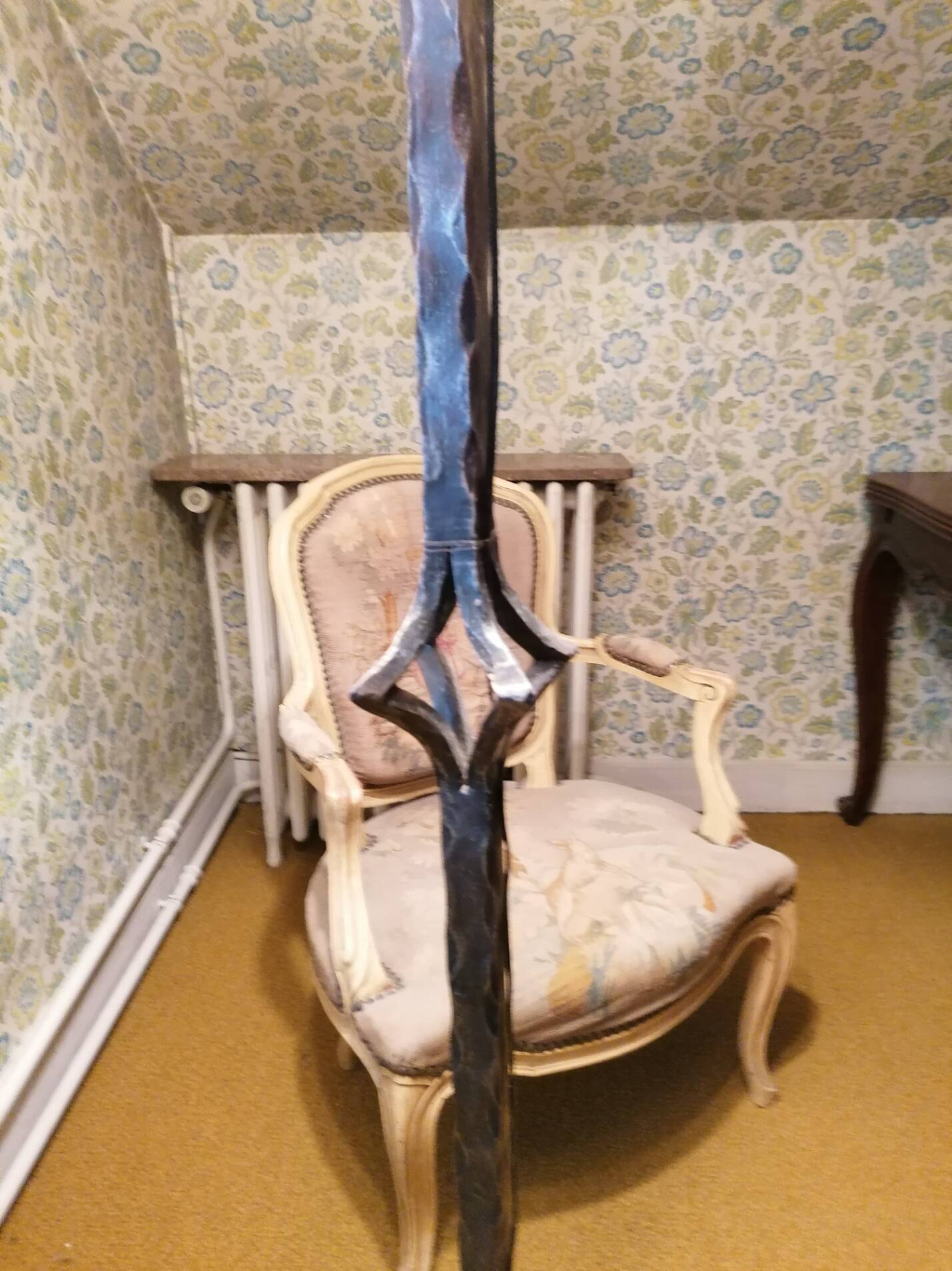 Wrought iron floor lamp.