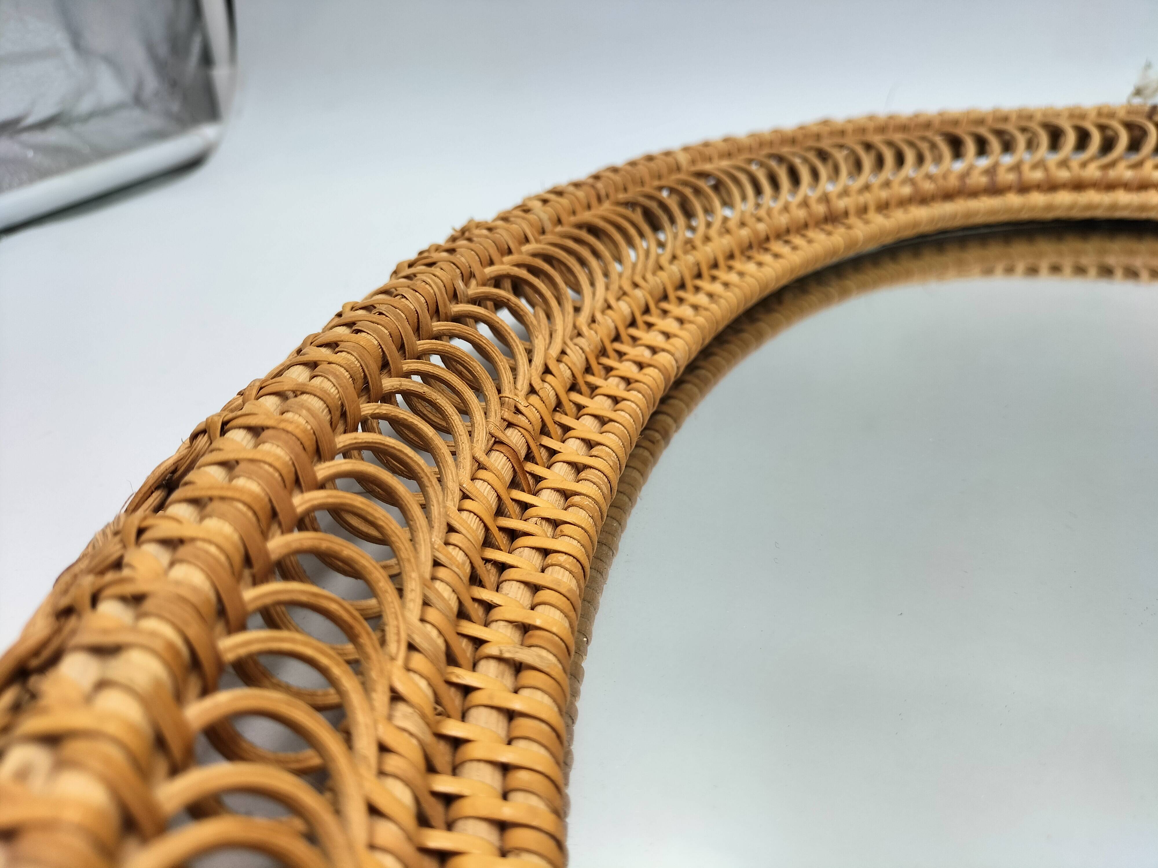 Oval rattan mirror