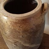 Terracotta pot with two vintage decorative handles