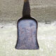 Old chimney shovel in wrought iron and brass