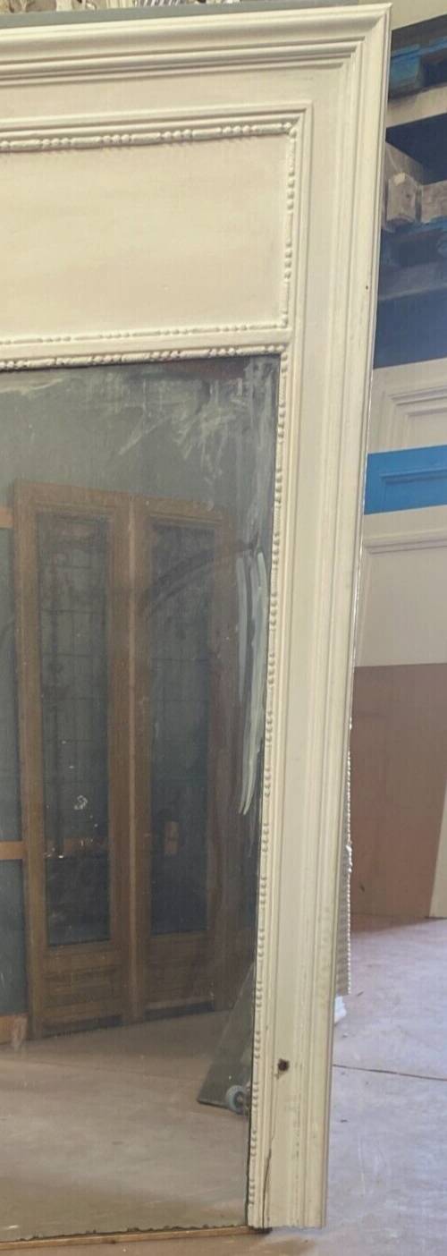 Louis XVI style mirror in wood and patinated stucco 20th century