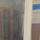 Louis XVI style mirror in wood and patinated stucco 20th century