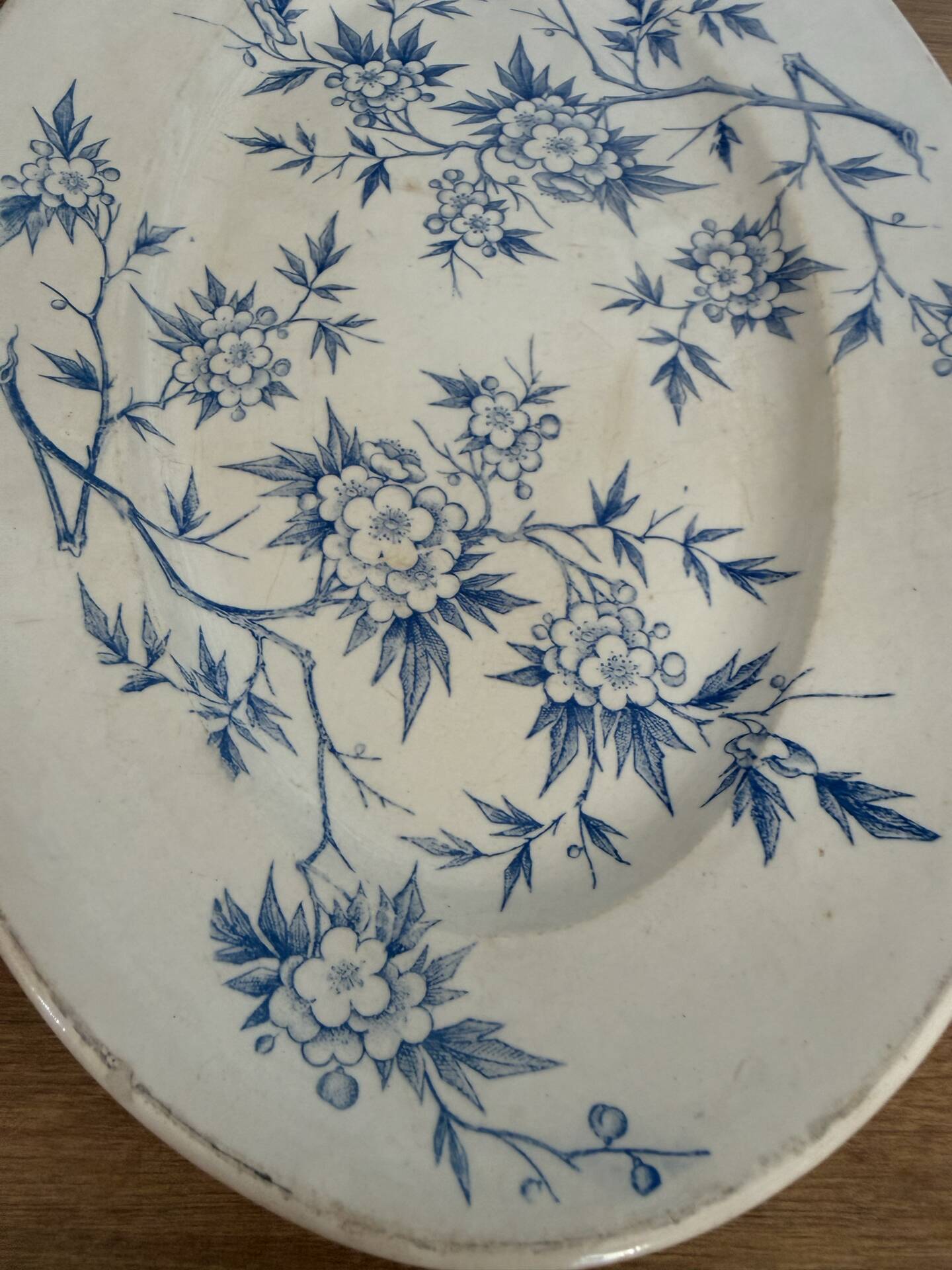 Old earthenware plate from Grigny – blue floral decoration