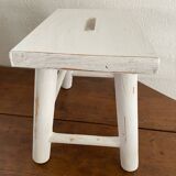 Small footrest bench in patinated white wood