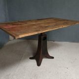 Old table on cast iron machine leg
