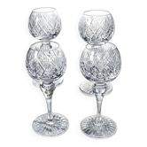 4 lead crystal wine glasses with slender baluster stems.