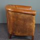 Club armchair in cognac-colored sheepskin