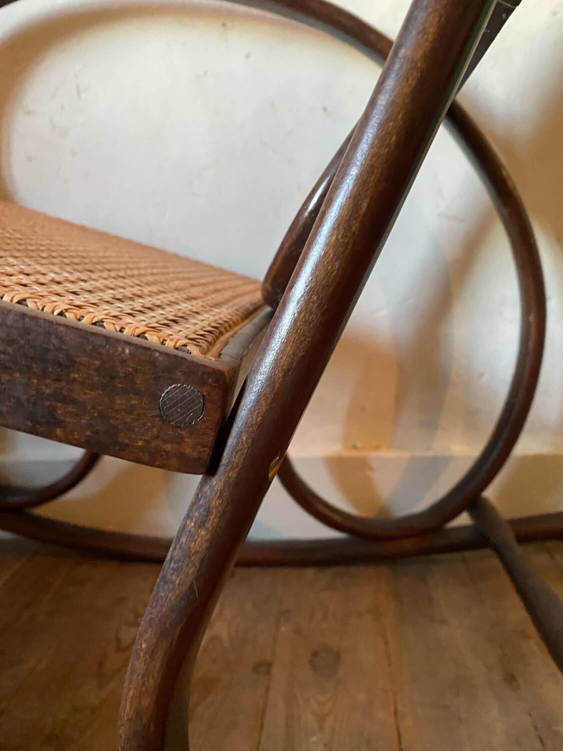 Wood and cane rocking chair