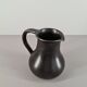 Modernist pitcher in black ceramic 50s