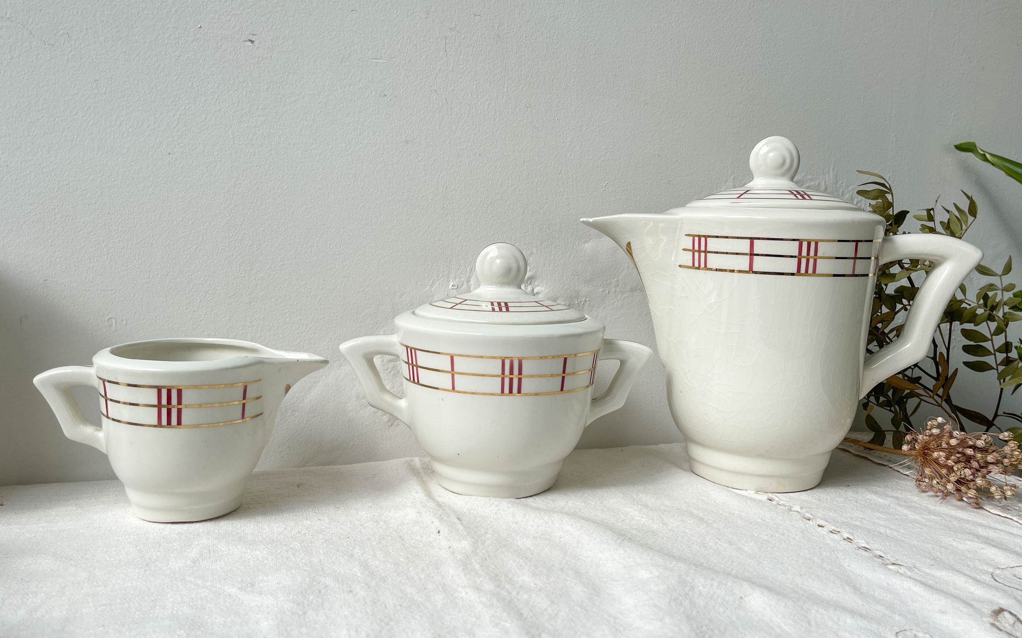 Vintage tea set in white porcelain with stripes, Moulin des Loups orcerame model "Richelieu"