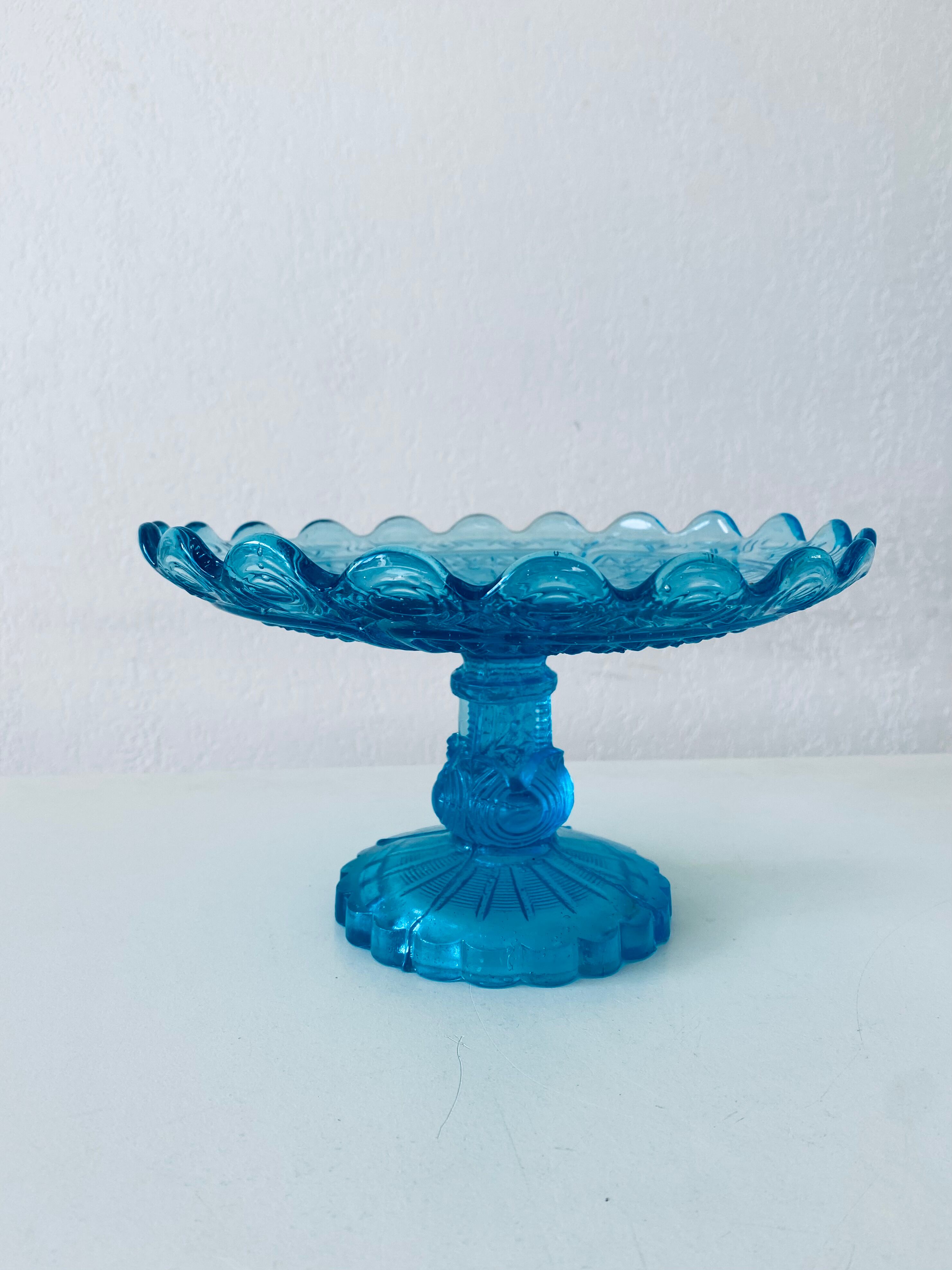 Blue glass stand cup