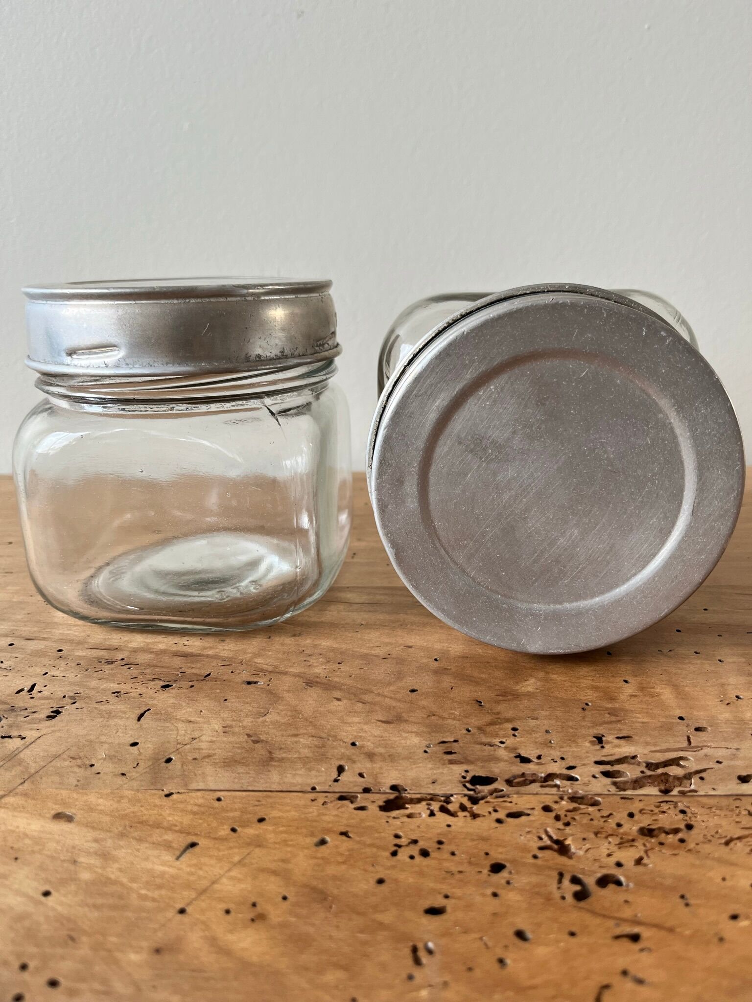 Set of 2 antique jars with aluminum lids